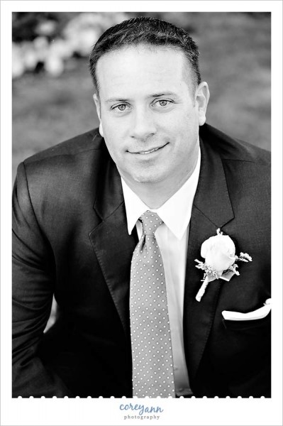black and white portrait of the groom