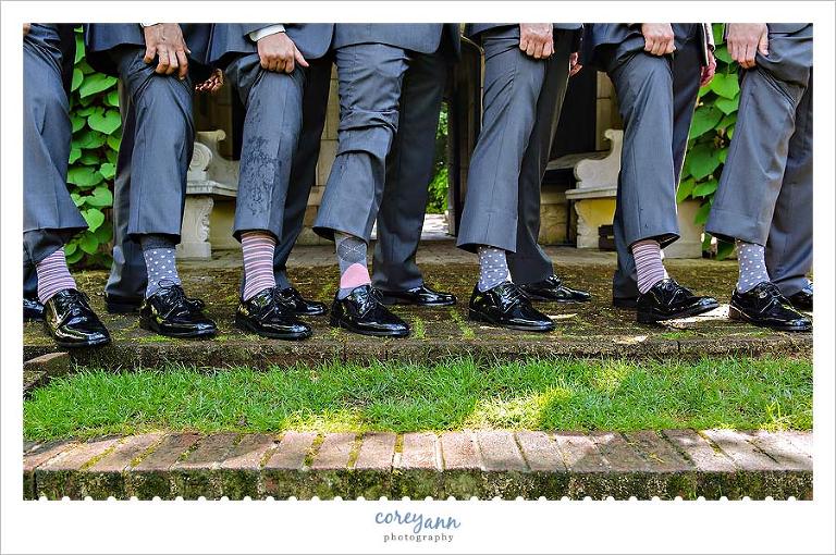groom with pink and grey socks