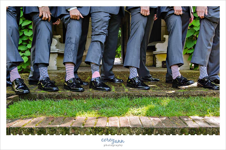 groom with pink and grey socks