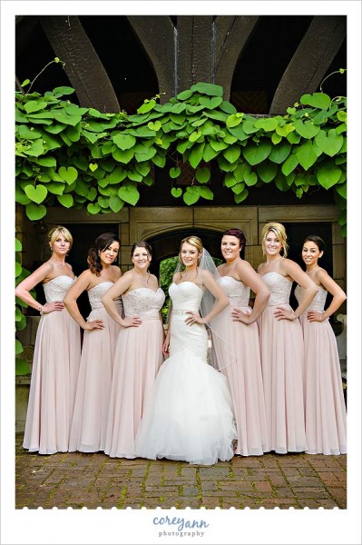 bridesmaids in long pink and white lace dress