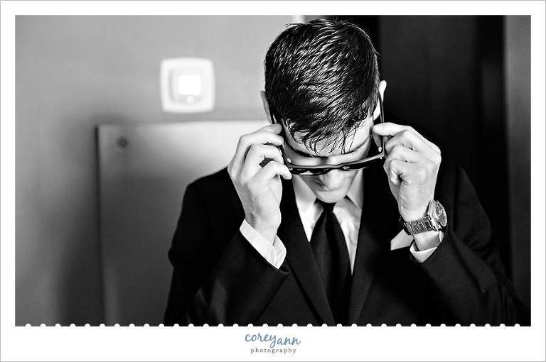 groom getting ready for wedding at the westin downtown cleveland 