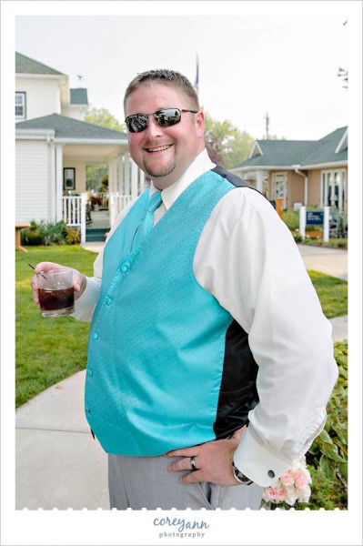 groom at wedding on the lake