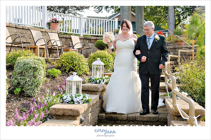 bride walking down aisle to ceremony 