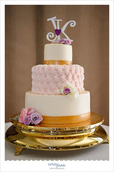 pink gold and purple wedding cake from michael angelo's bakery