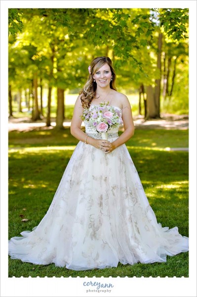 bride with david's bridal gown with gold embroidered roses