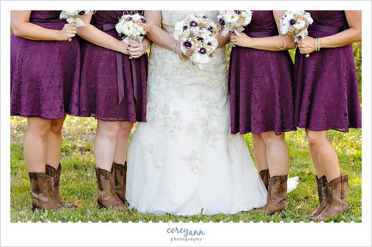 bridesmaids in short dresses with cowboy boots and crystal blooms bouquets