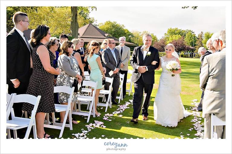 wedding ceremony on a tee at a golf course in ohio