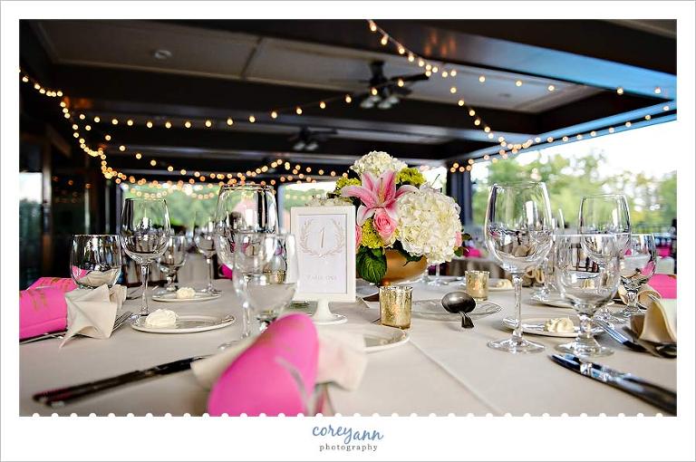 wedding reception decor in pink and green at mayfield sand ridge club in ohio