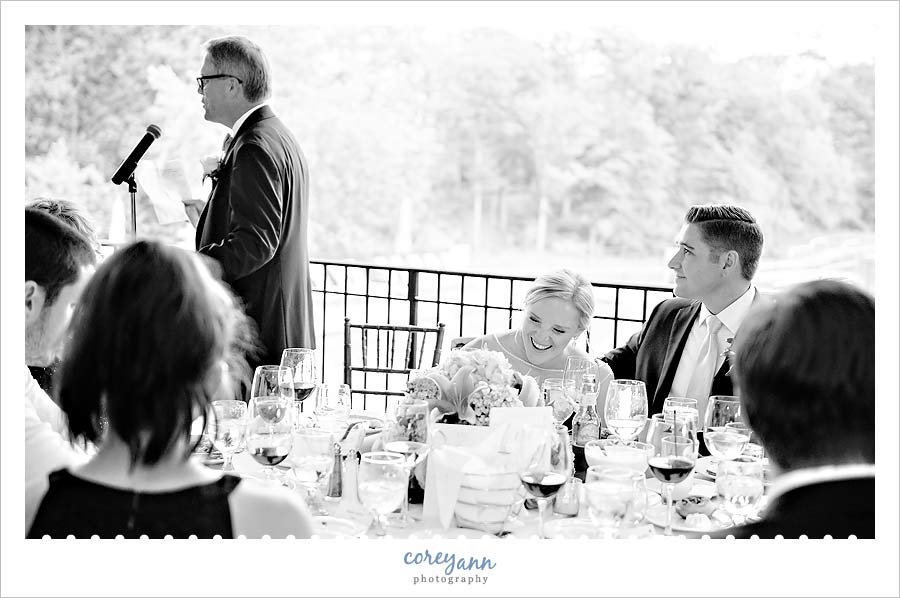 father of the bride toasting couple 