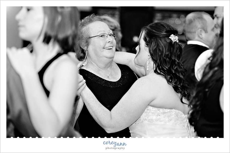 bride and mom dancing during wedding reception