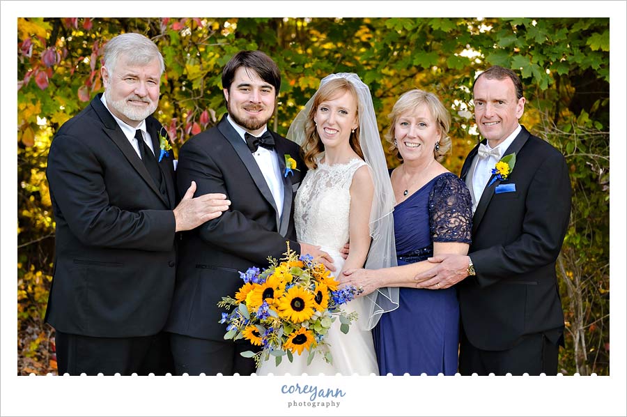 bride and groom with parents 