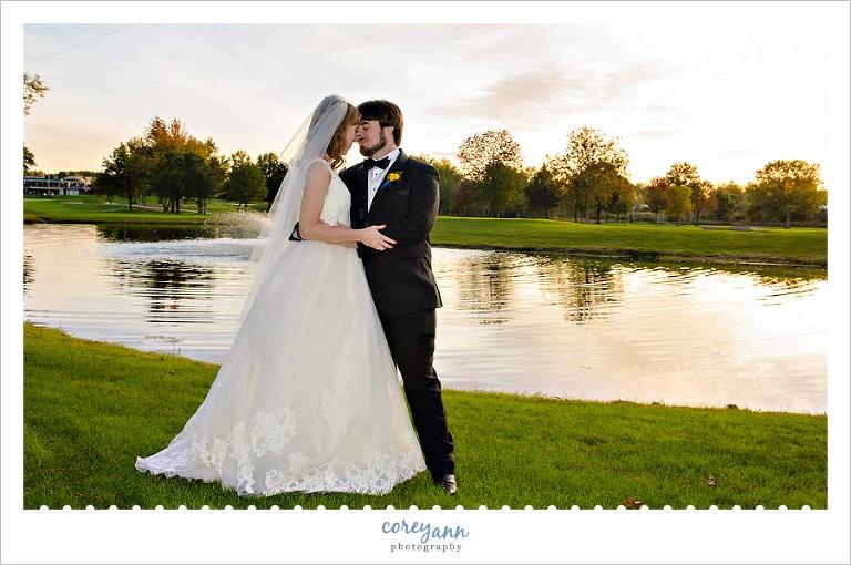 wedding portrait on golf course at sunset