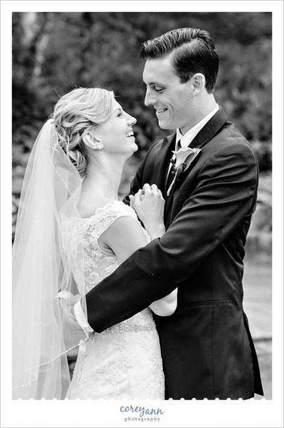 bride and groom giggling during portraits