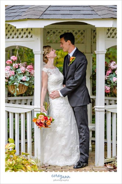 bride and groom in gazebo at tom's country place