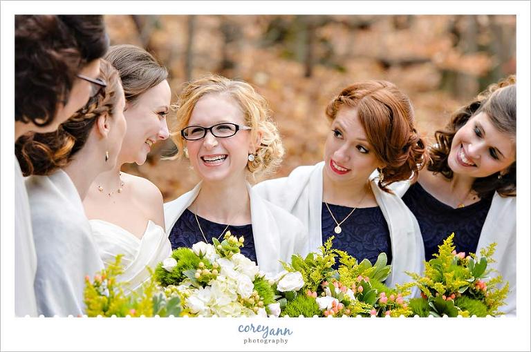 bride laughing with bridesmaids at lanterman's mill