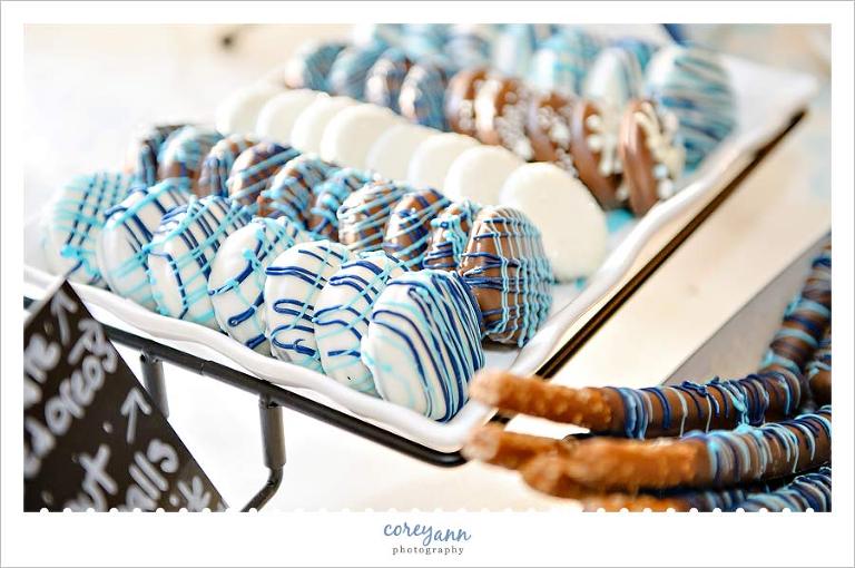 chocolate covered oreo wedding favors in blue and white