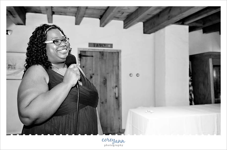 giving toast to brides at wedding in ma