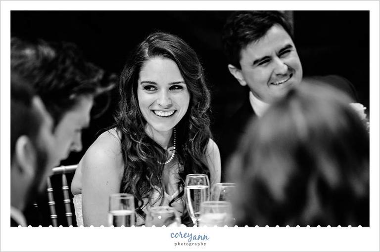 Bride and Groom laughing during toasts in cleveland ohio