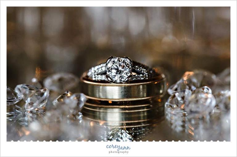 Wedding Rings sparkling on mirror 