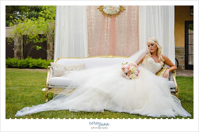 Bride on a couch at Gervasi Vineyard in Canton Ohio