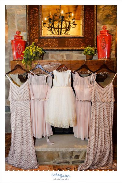 Dresses for wedding on fireplace in Canton