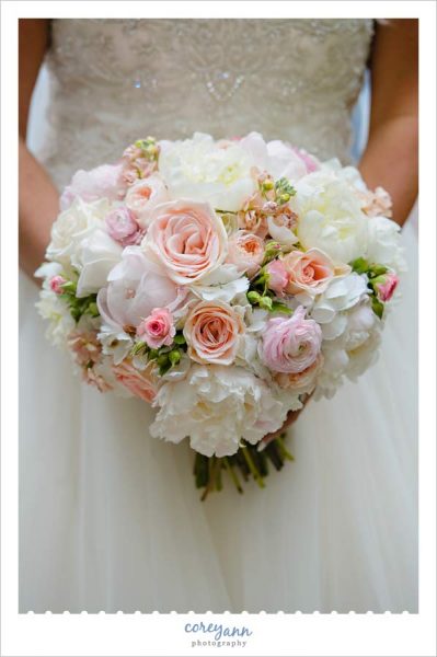 White pink and peach wedding bouquet with roses and peonies
