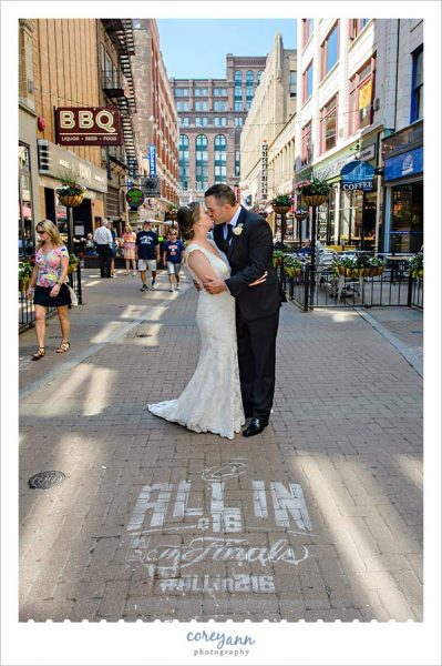Wedding Picture Near All In CLE sign on East 4th Street