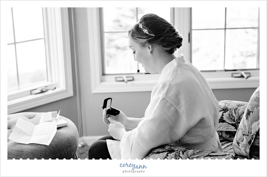 Bride Opening Wedding Gift from Groom