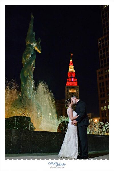 Night wedding photograph with cleveland cavaliers colors on terminal tower