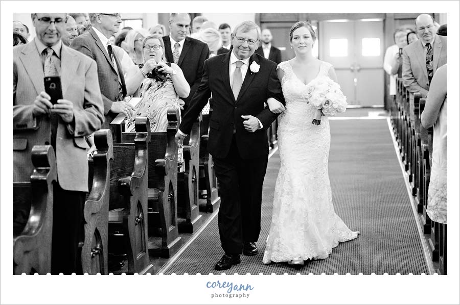 Bride walking down aisle at Holy Trinity in Avon