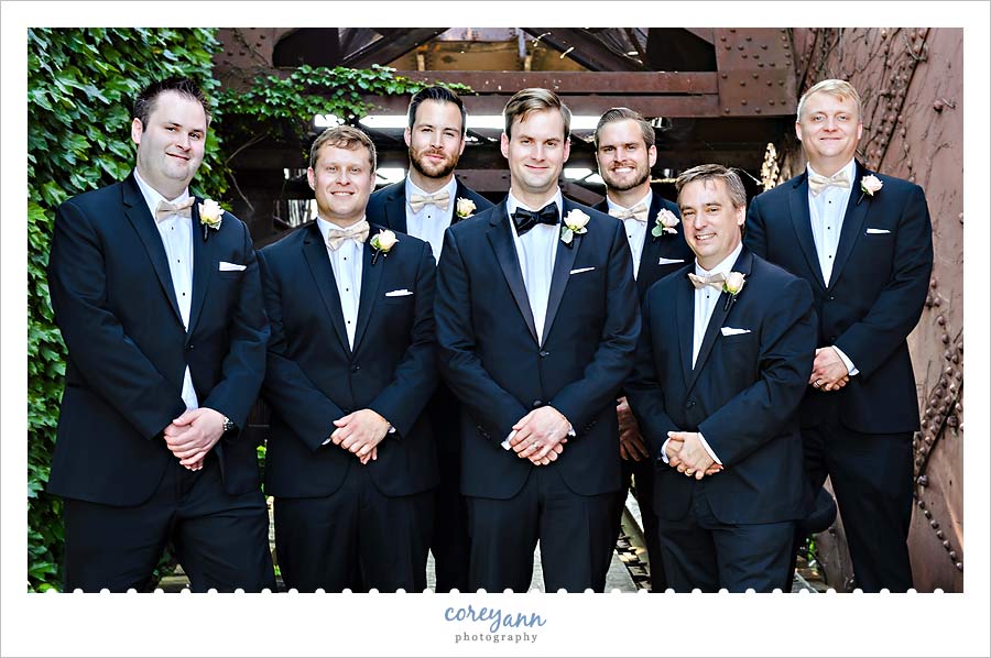 Groom and Groomsman in Black Tuxes