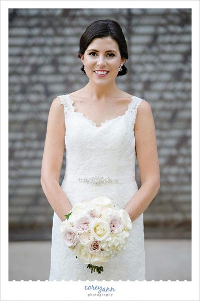 Bride in white lace mori lee wedding gown in Cleveland Ohio