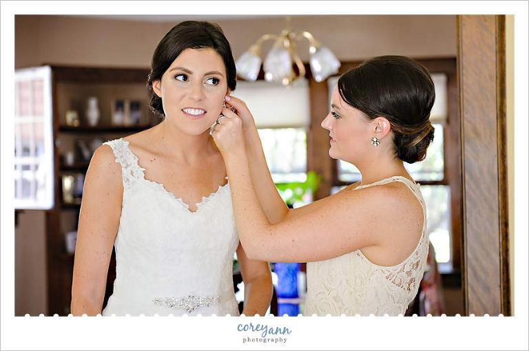 Maid of Honor and Bride getting ready for wedding