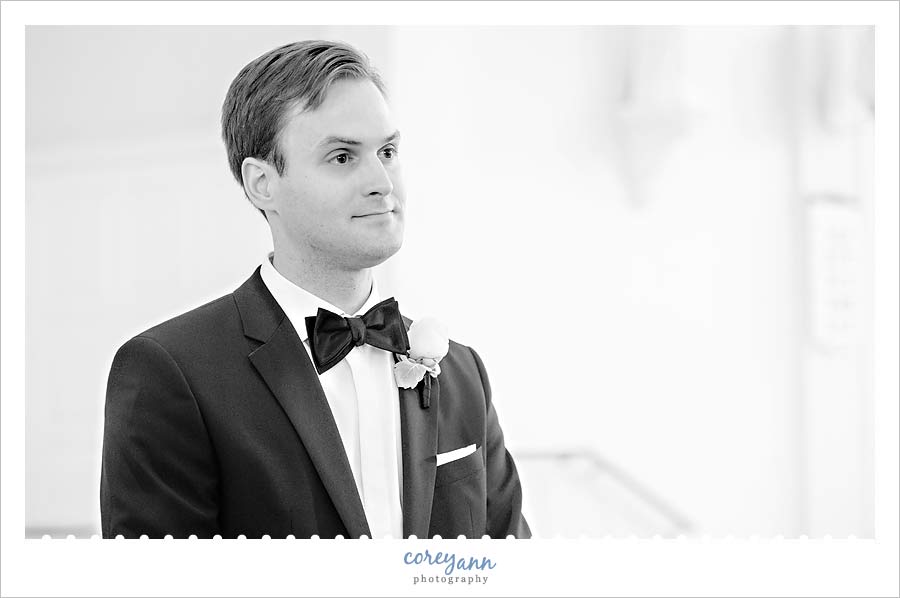 Groom tearing up when seeing bride