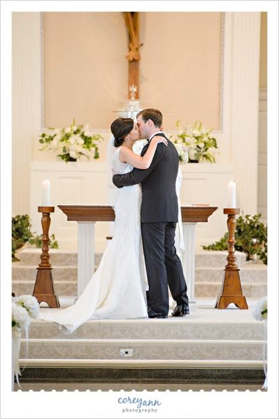 First kiss during wedding ceremony at church of st dominic