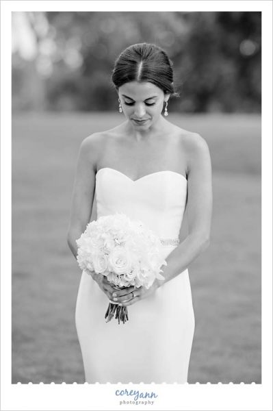 Bride with white bouquet from enchanted florist
