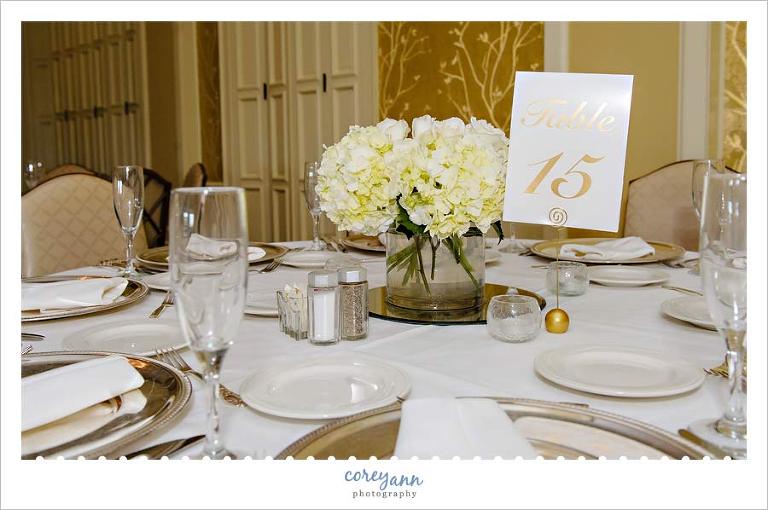 white and gold reception decor at brookside country club