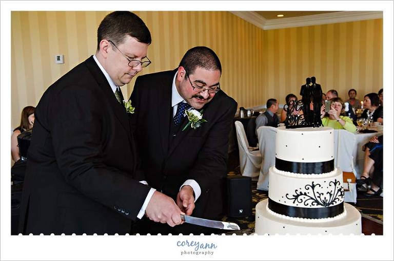 Cutting the Wild Flour Wedding Cake at Reception at the Crowne Plaza