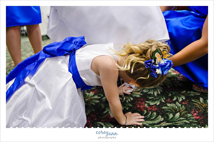 Flower Girl Helping Bride Get Ready