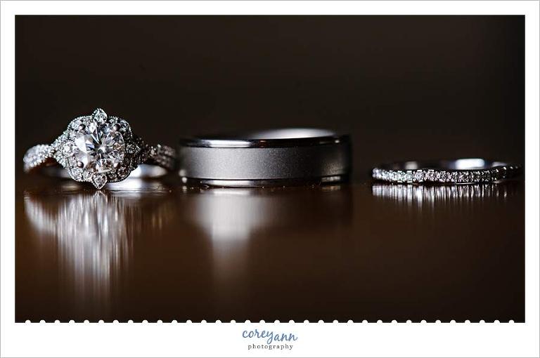 Wedding Rings on Table with Reflection