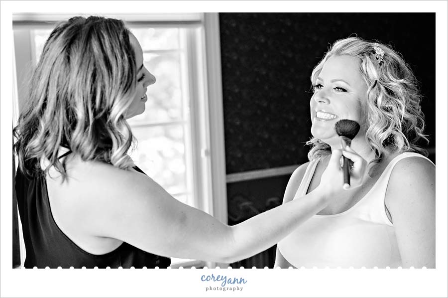 Bride getting ready for wedding on lake erie