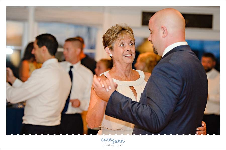 Mother son dance at wedding reception in rocky river