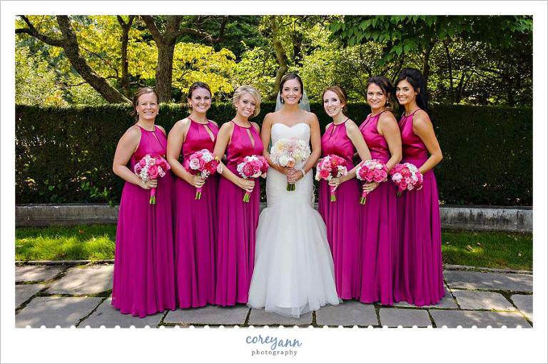 Bride and bridesmaids with long pink gowns 