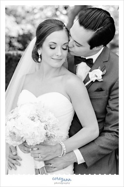 Black and white wedding portrait of bride and groom