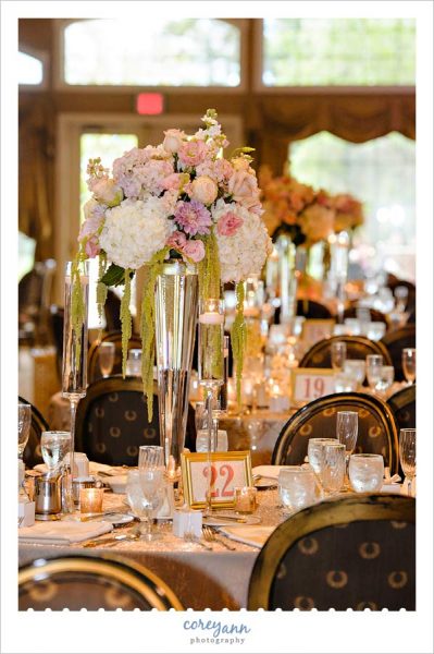 Tall floral centerpiece by Pink Petals Florist at Weymouth Country Club