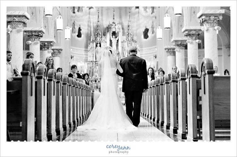 Bride and Father entering wedding ceremony at St John Cantius in Tremont