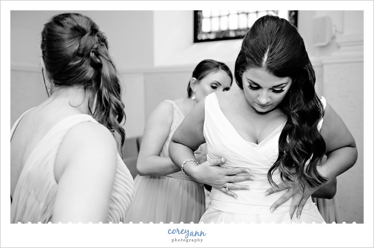 bride getting ready at st vincent de paul in akron