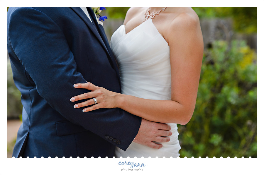 bride and groom holding one another in sandusky
