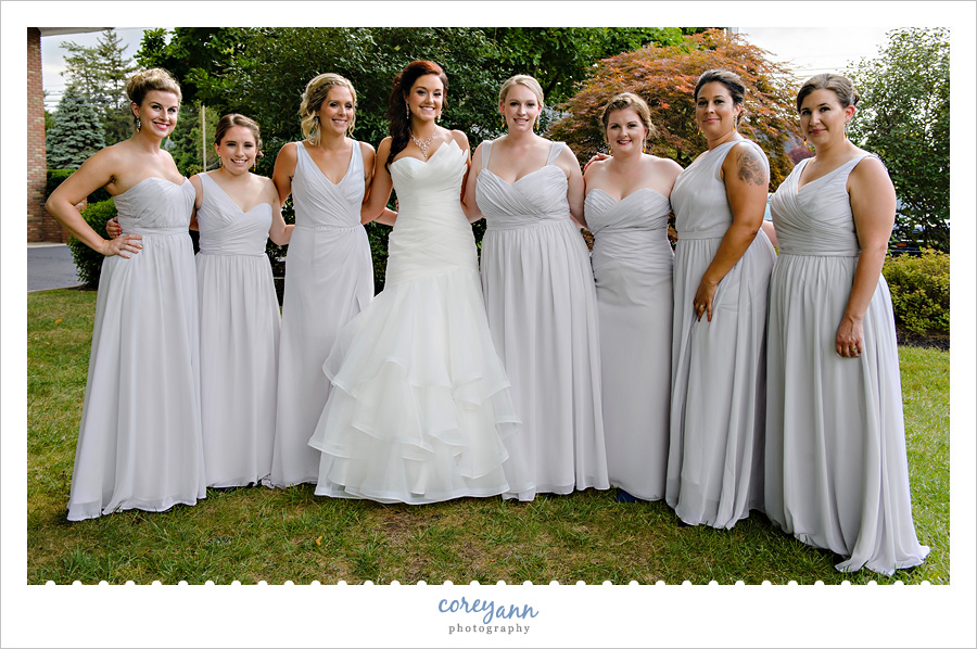 bridesmaids in different grey gowns