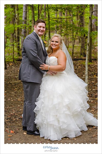 bride and groom at brecksville reservation for wedding photos